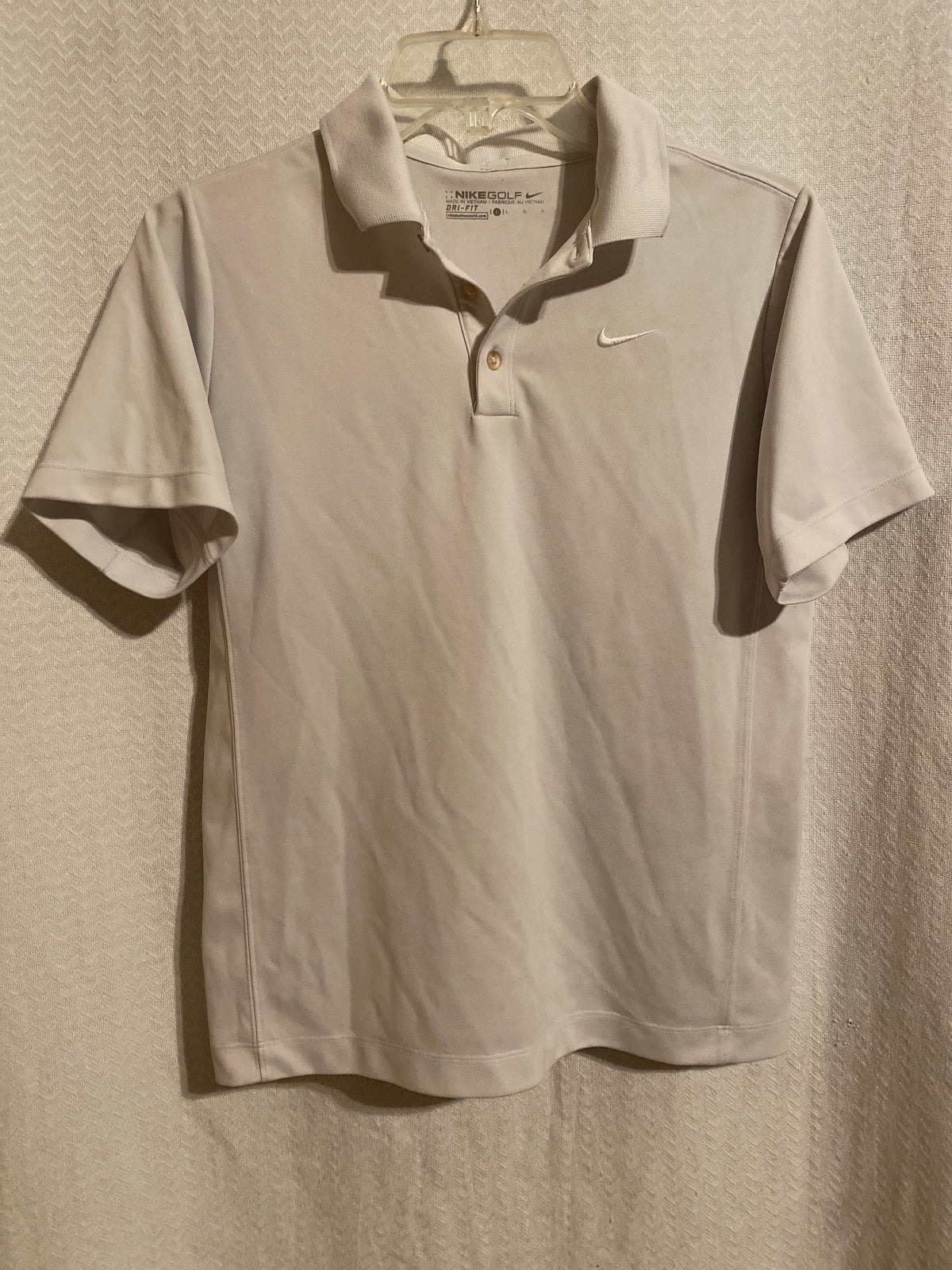 NIKE white golf Polo shirt tag says L - size Teen/Men - M (32-34)