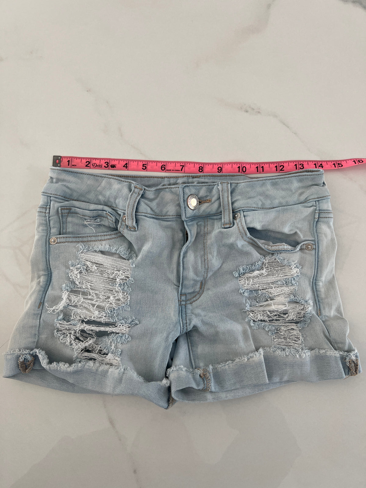 American Eagle jean shrt Sz6 lt wash midi strtch - size Junior - S (3/5)