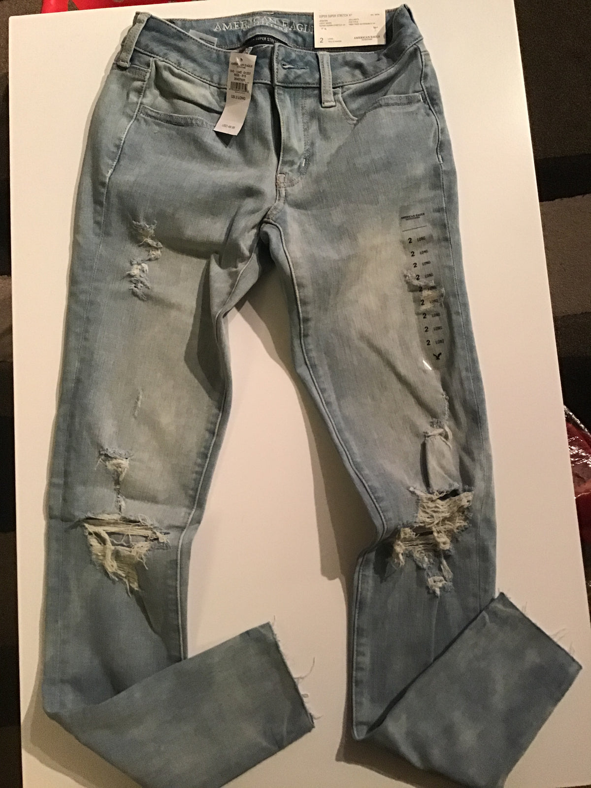 American eagle brand new Strech long blue jeans - size Junior - XS (0/1)