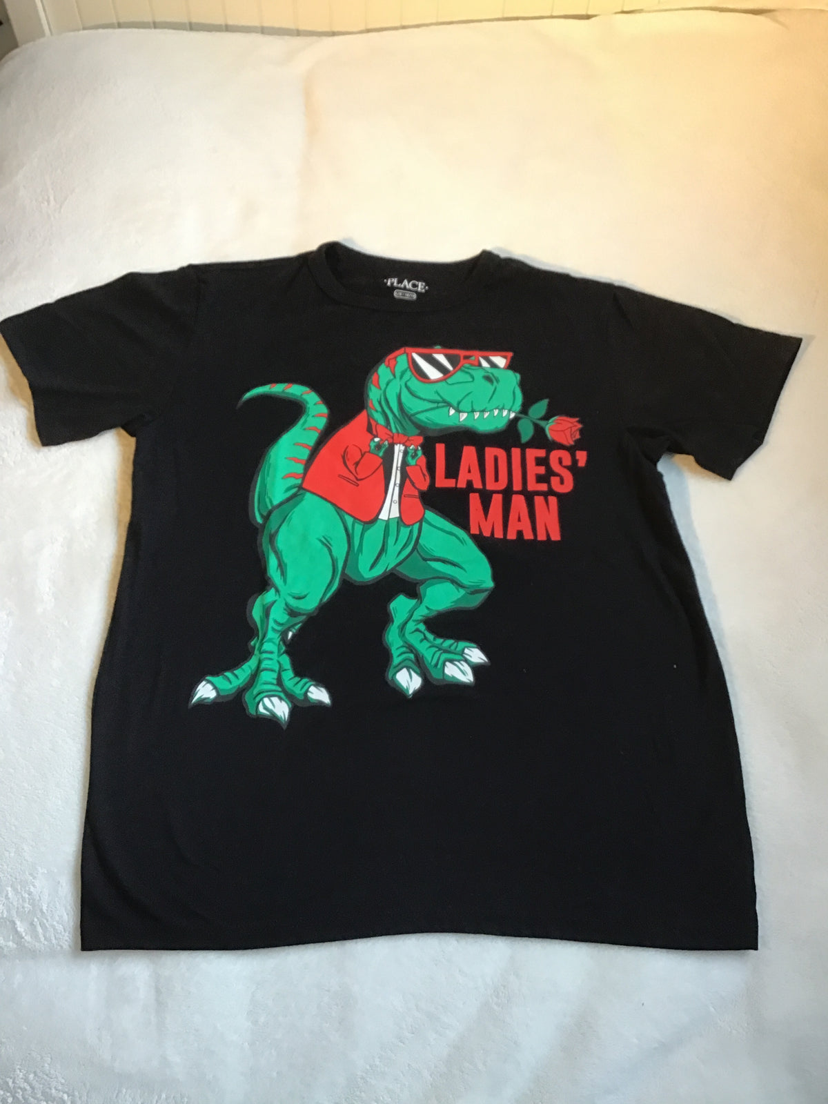 Children place black Tsh W/ Dino on front - size Youth - 10 (L)