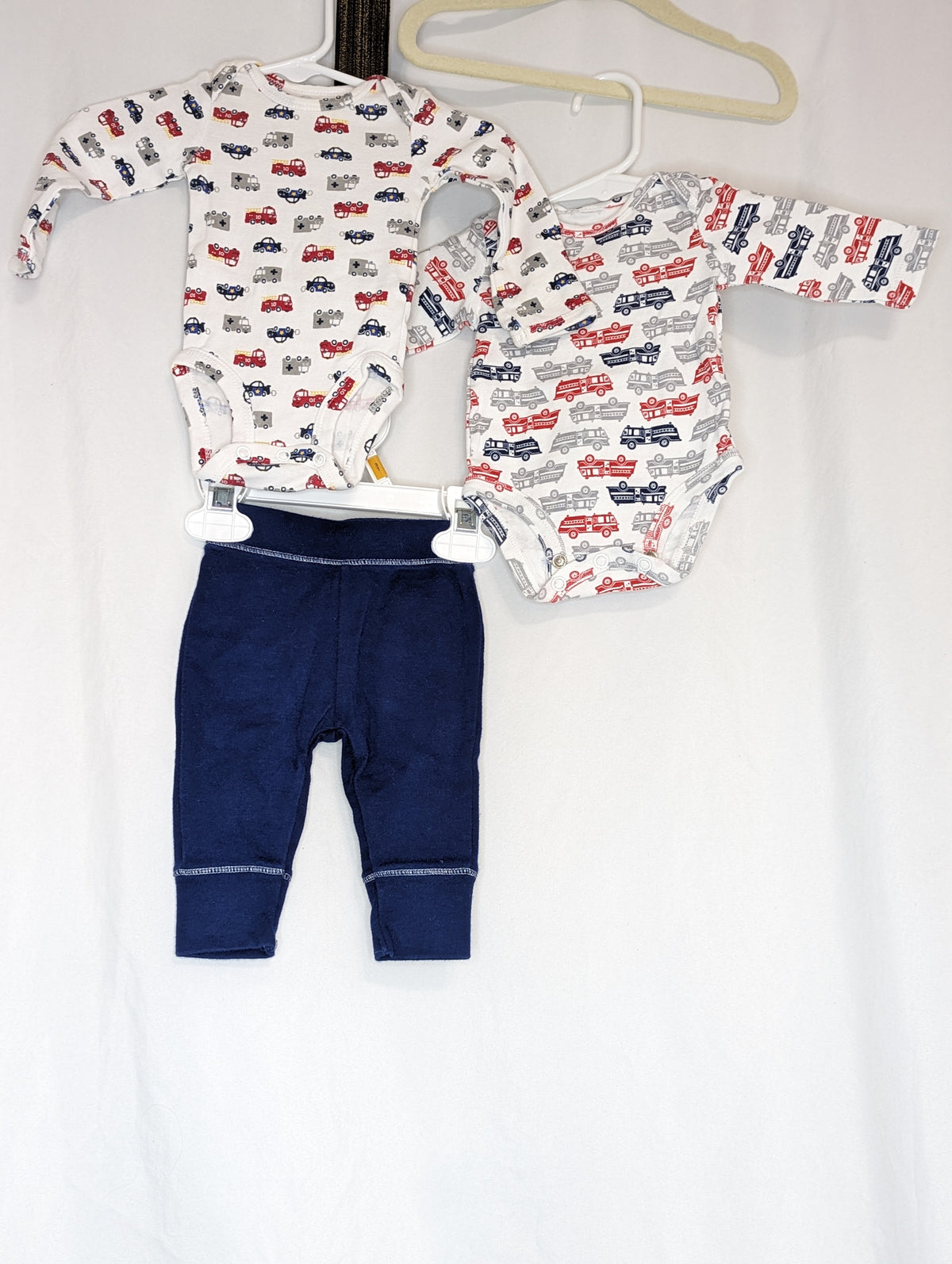 EUC 3pc, navy pants, l/s emergency vehicle onesie - size Month - Newborn