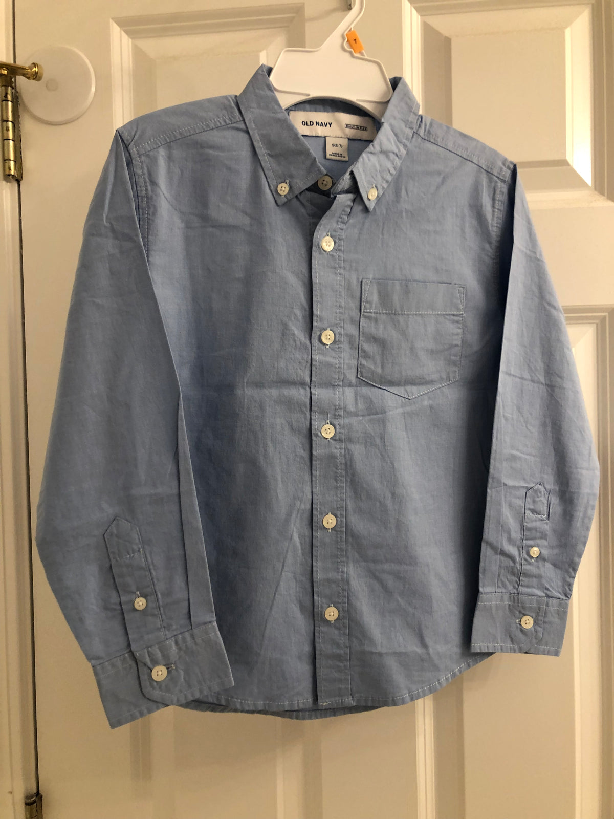 ON new dress shirt Baby blue. Long sleeve - size Youth - 7 (S)