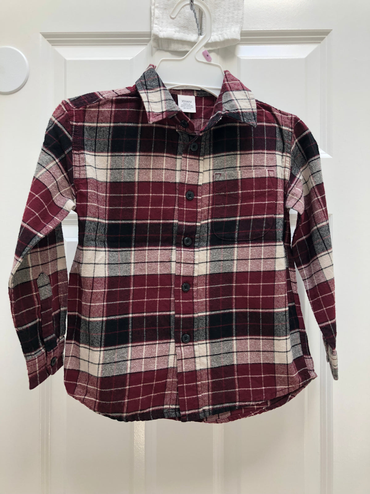 Plaid dress shirt Long sleeve. Hardly worn - size Youth - 5 (XS)