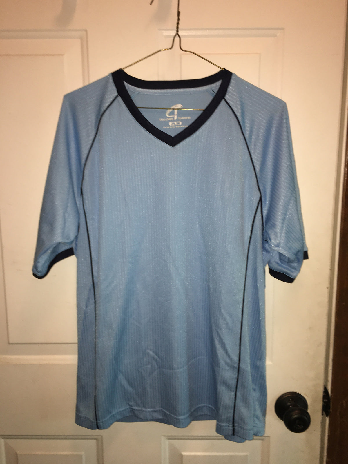 Light blue soccer jersey #66 on back (Challenger) - size Teen/Men - S (29-31)