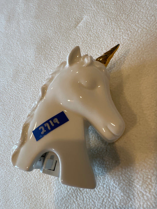 Unicorn nite light Plugs into wall