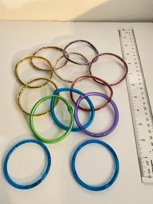10 soft plastic glitter Wristbands & 2 hard