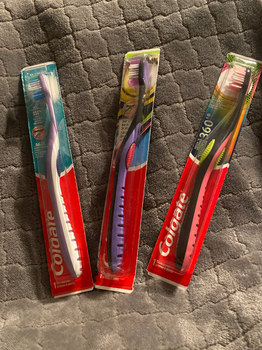 3 brand new Colgate Purple tooth brushes