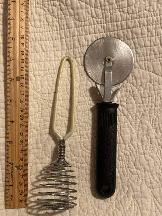 Masher and pizza cutter