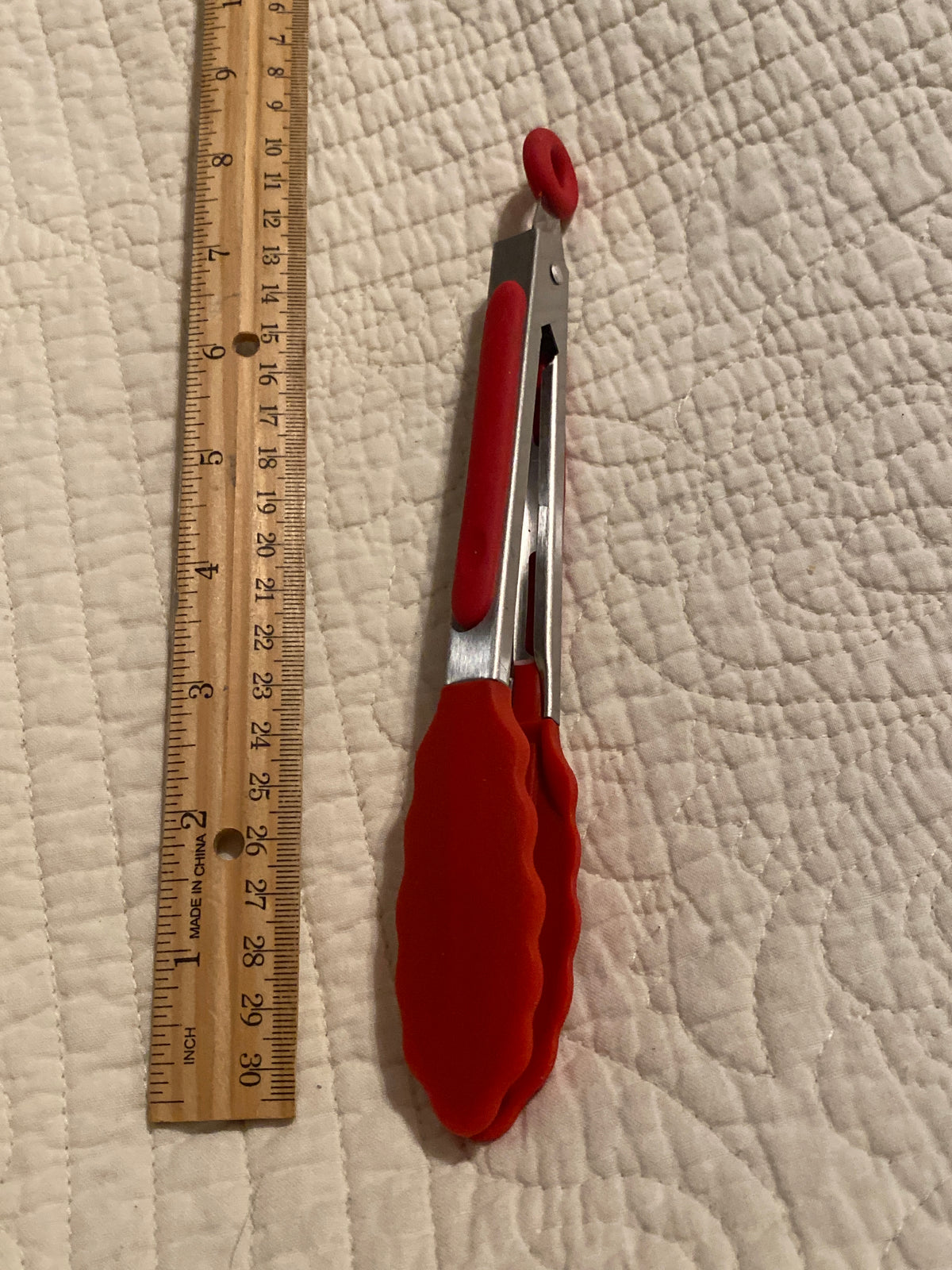 Small tongs Metal w red rubber on