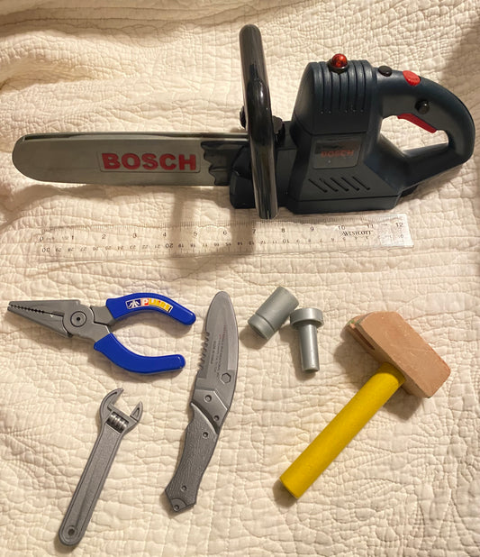Bosch chain saw makes Noise & lights up &
