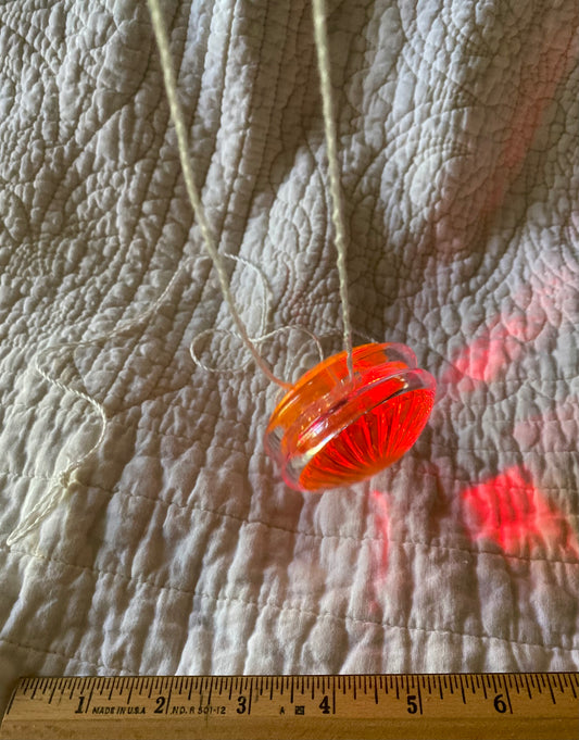Orange light up Yo yo