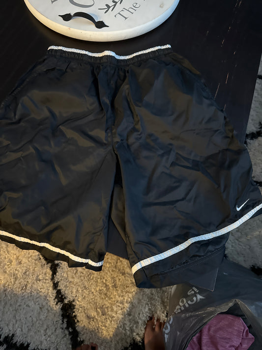 Black Nike shorts - size Teen/Men - M (32-34)