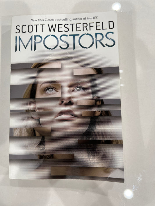 Imposters paperback EUC