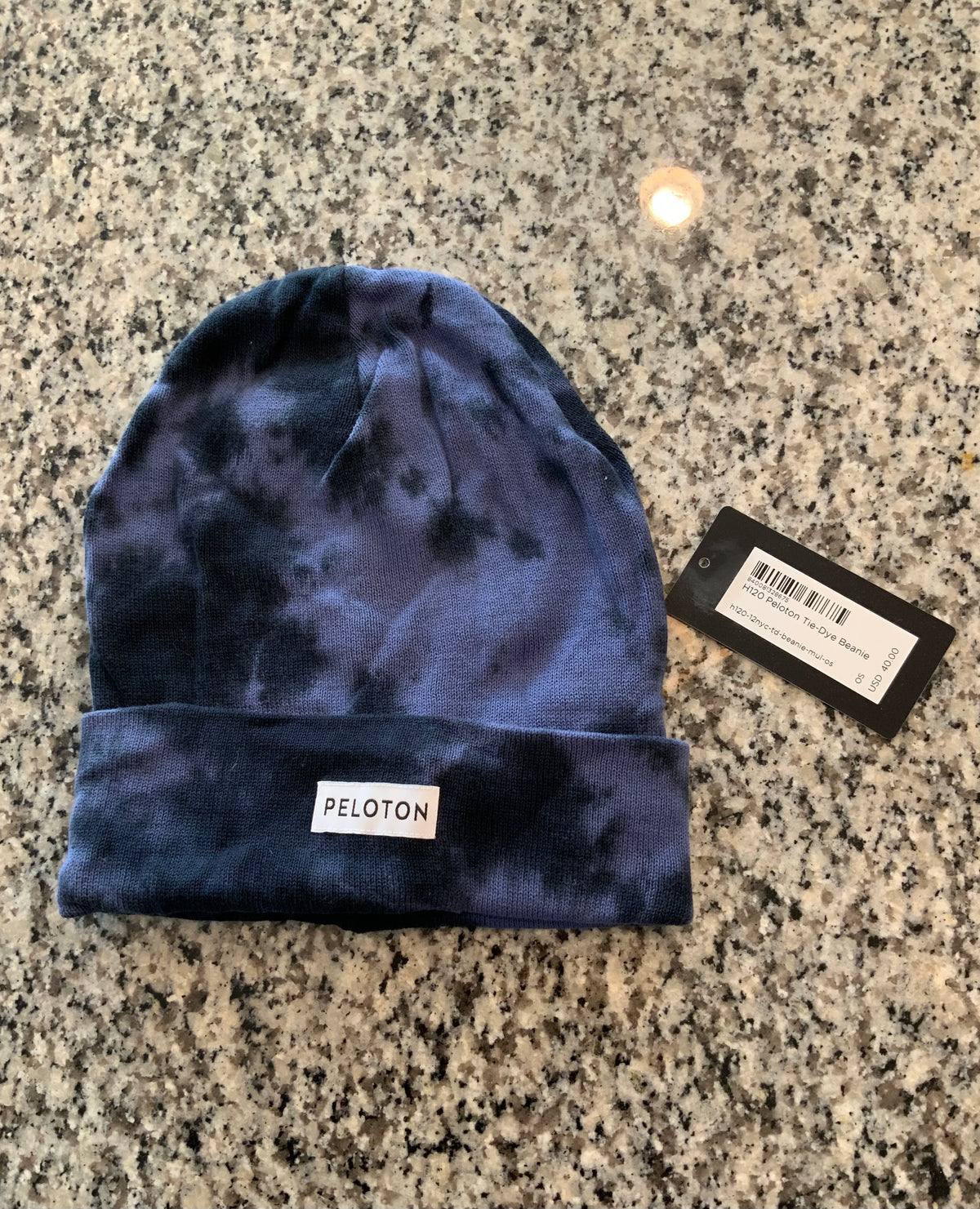 new peloton tie dye ski hat black and blue
