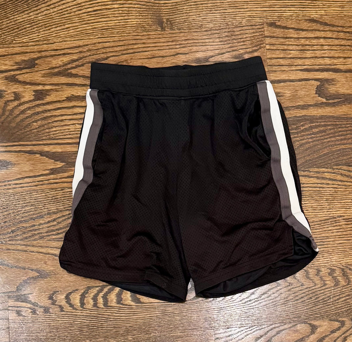 All in motion 8/10 black Shorts, white/grey strip - size Youth - 8 (M)