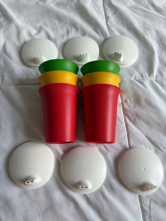 Tupperware kids cups w/ lids. Some marks to lids