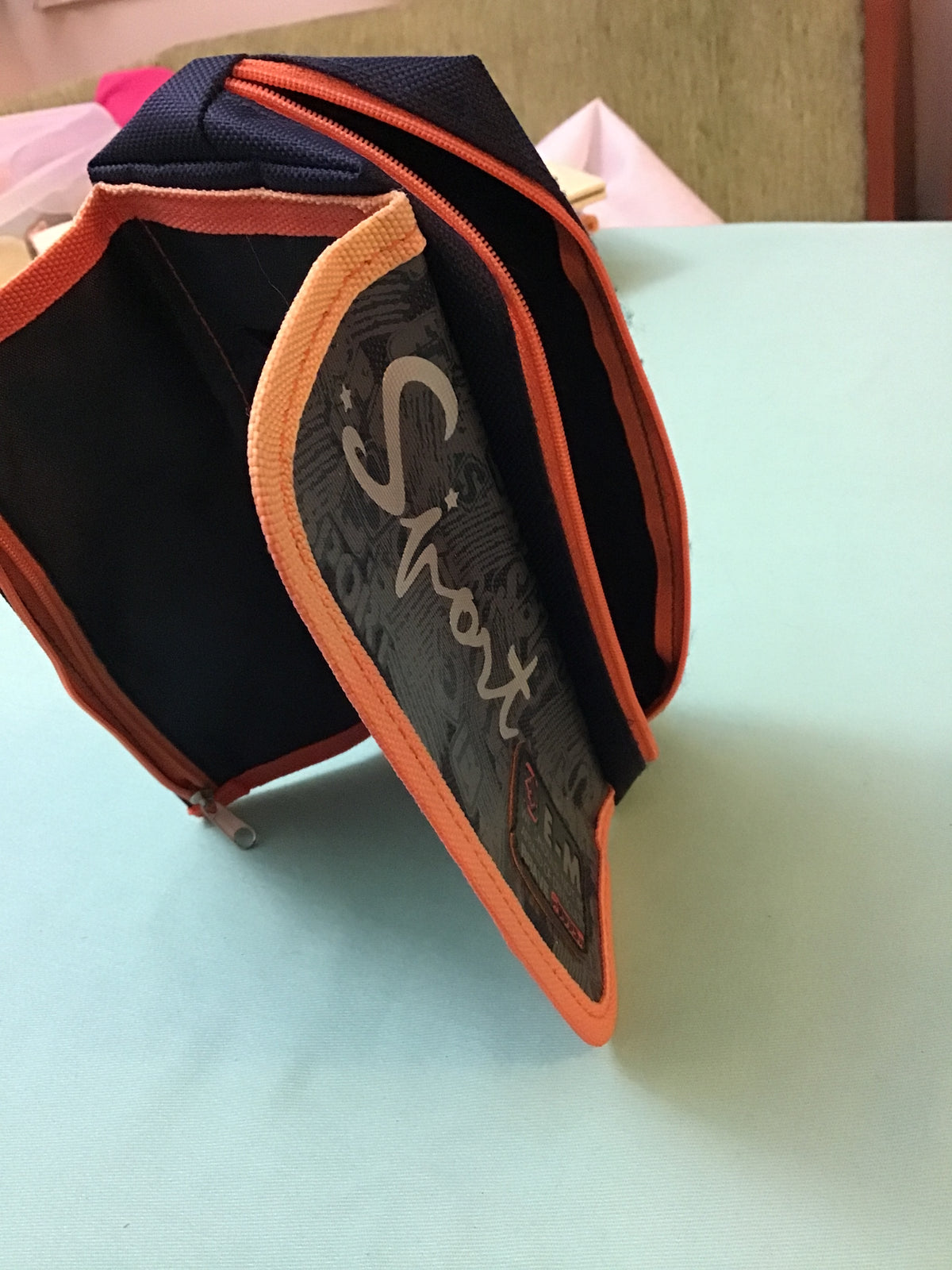 Navy pencil case with 2 zippers and packet