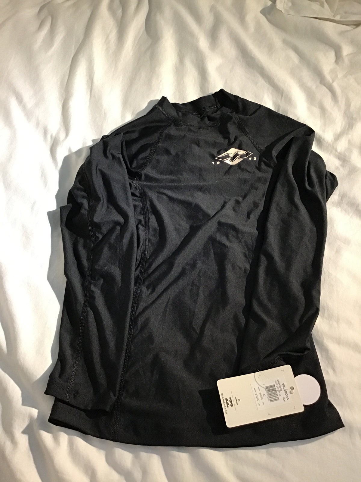 Billabong UVA/UVB prot NWT black swim shirt