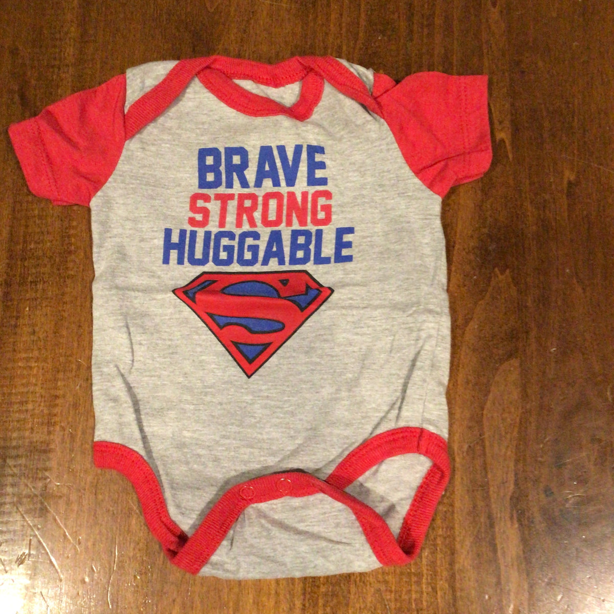 Super Man S/S GUC Brave Strong Huggable - size Month - 0-3 / 3M