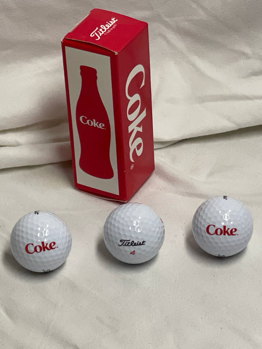 Brand new set of 3 Titleist Coke golf balls