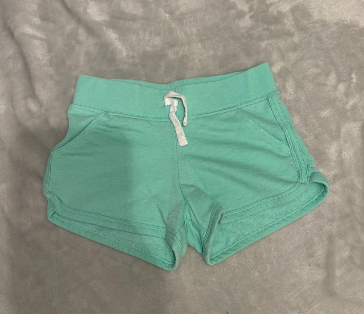 Mint green shorts - size Youth - 6 (S)