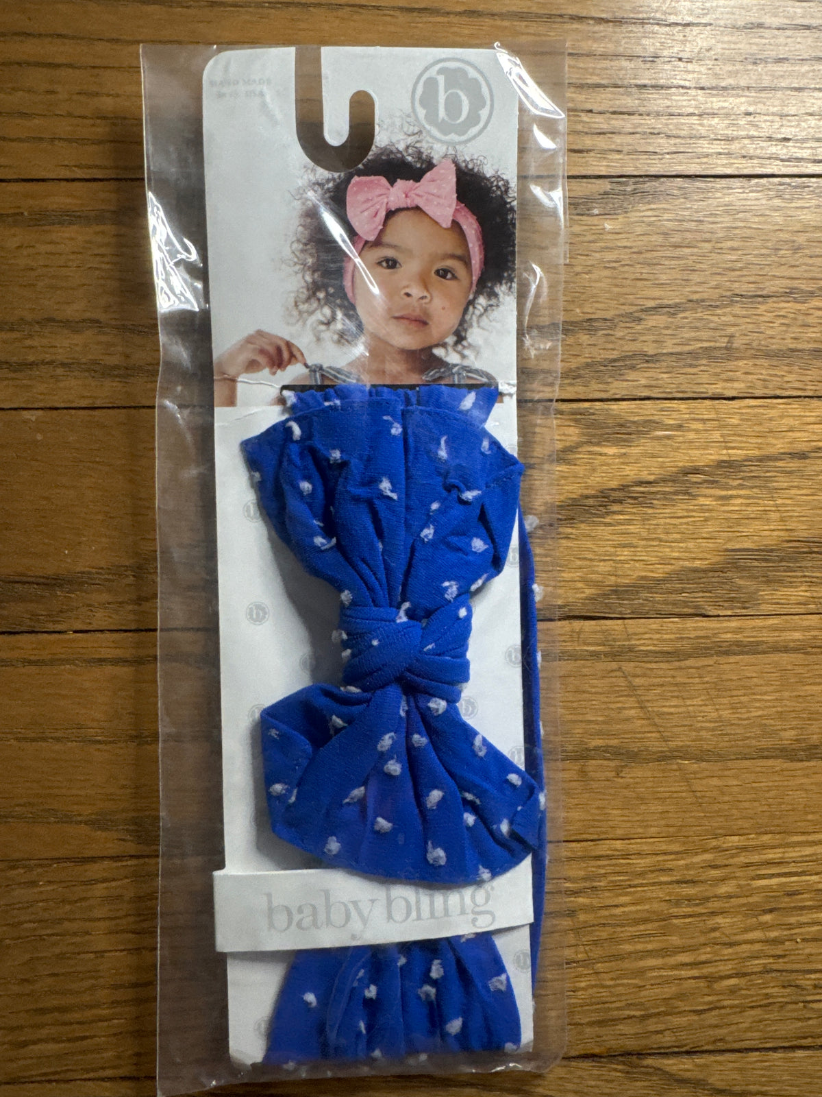 Baby bling bow NIB blue with white dots