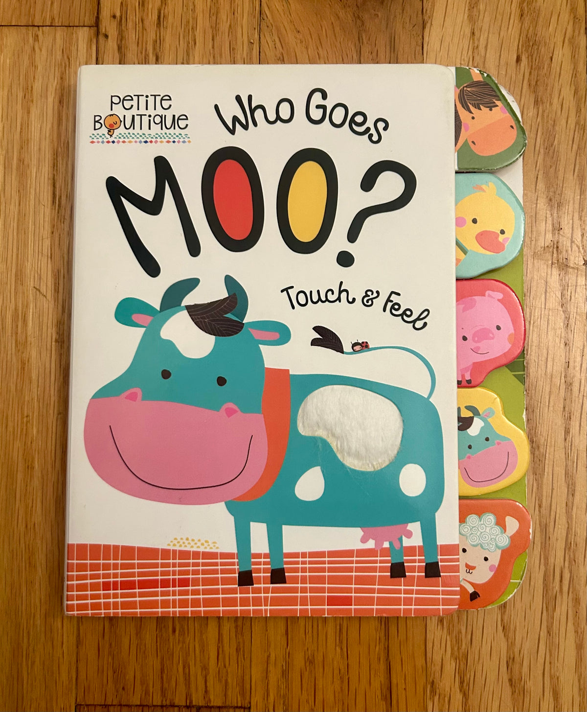 Who Goes Moo? Touch and Feel book