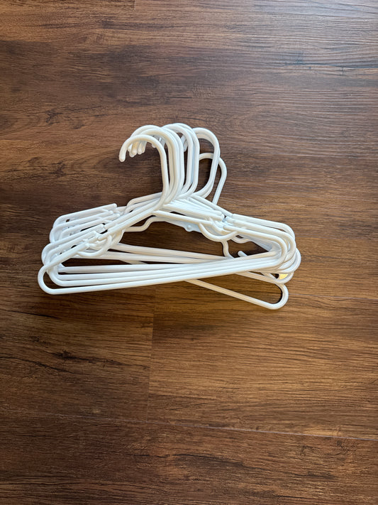 12 white kids hangers Plastic