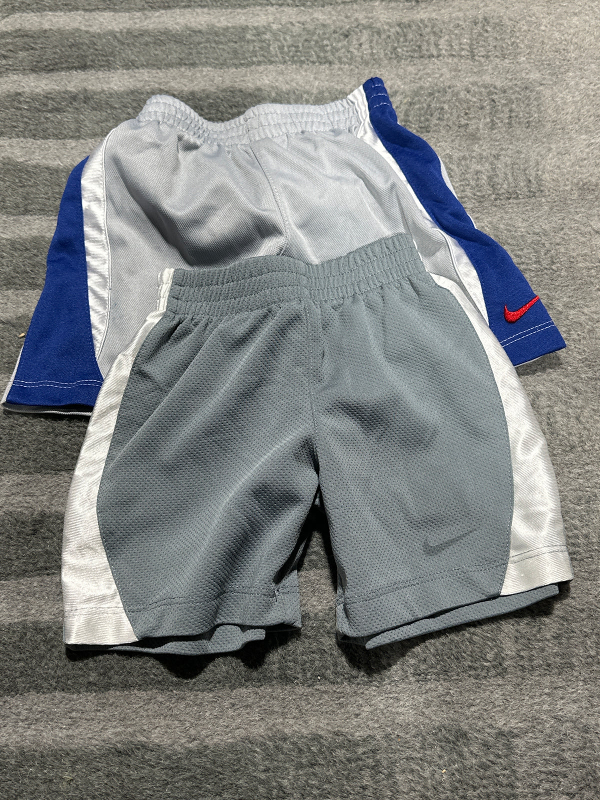 2 pairs of Nike basketball shorts - size Month - 12-18 / 18M