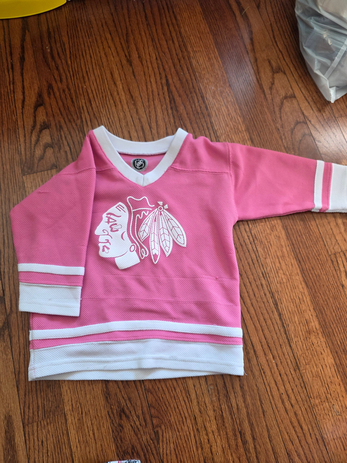 Pink blackhawks Jersey with snags. - size Toddler - 3T