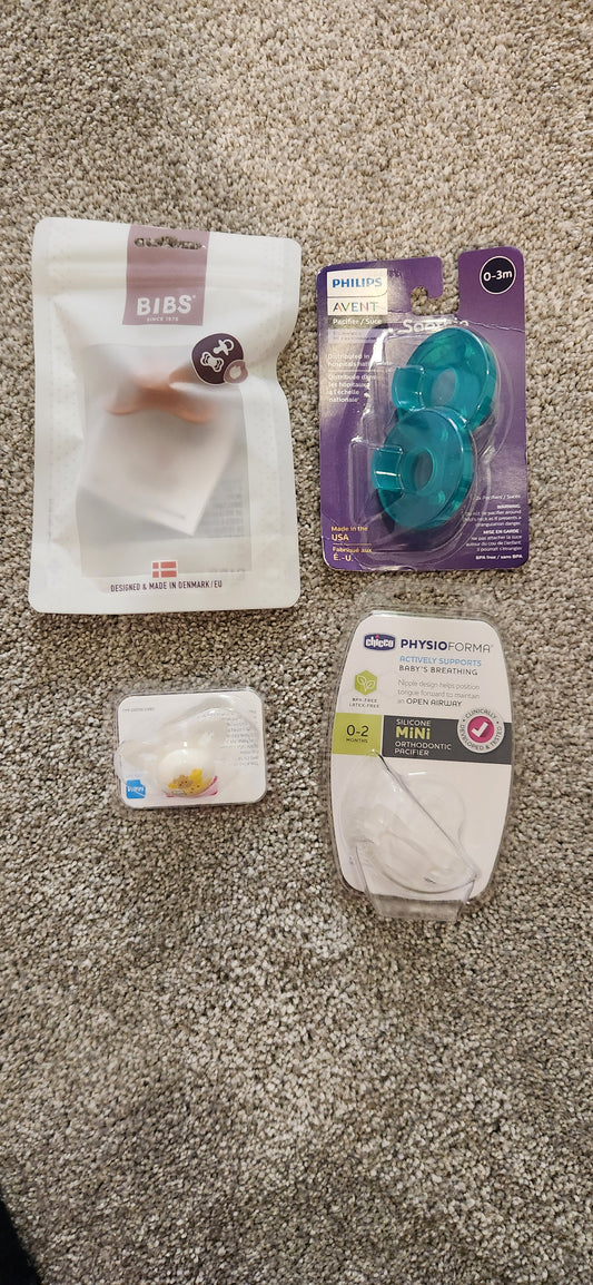 Miscellaneous Pacifiers Unused and unopened