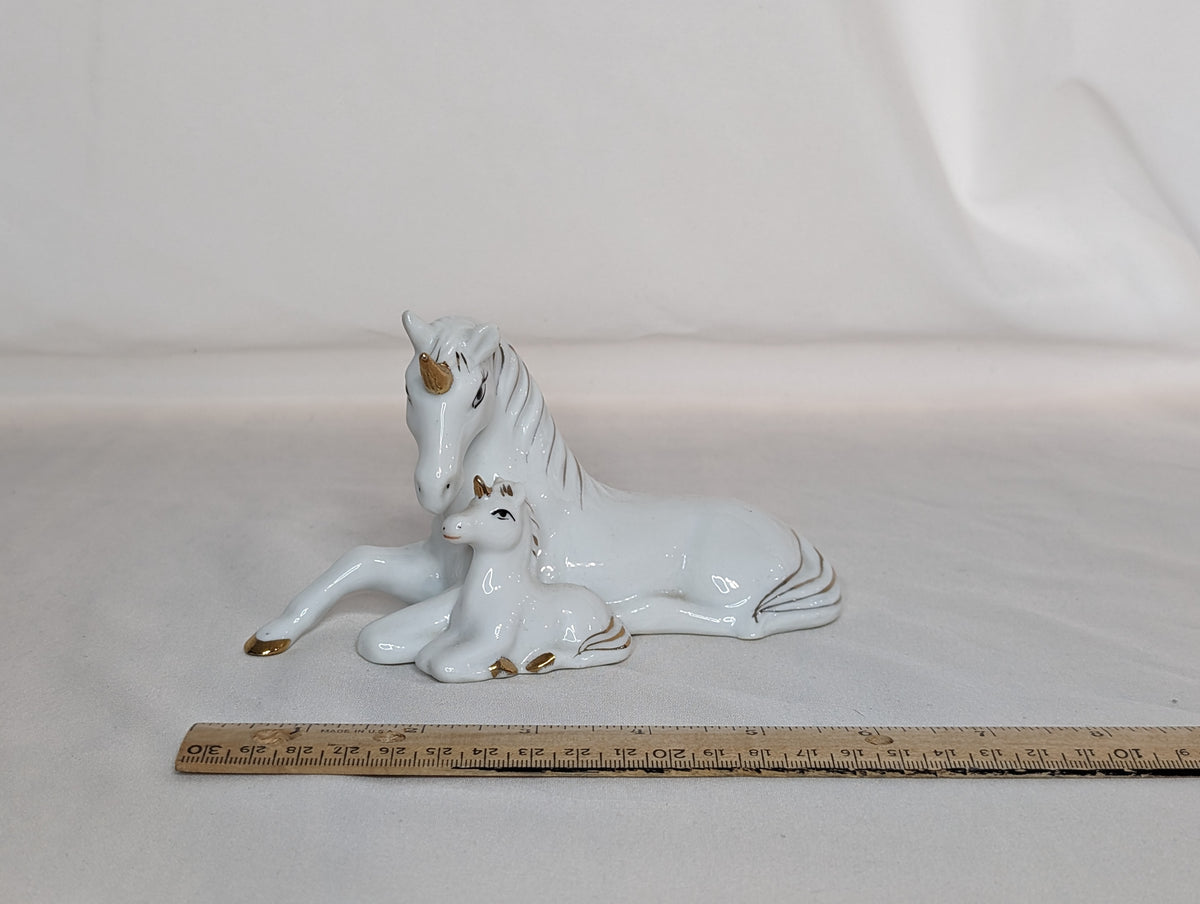 EUC Mom lying w/baby unicorn statue, white w/