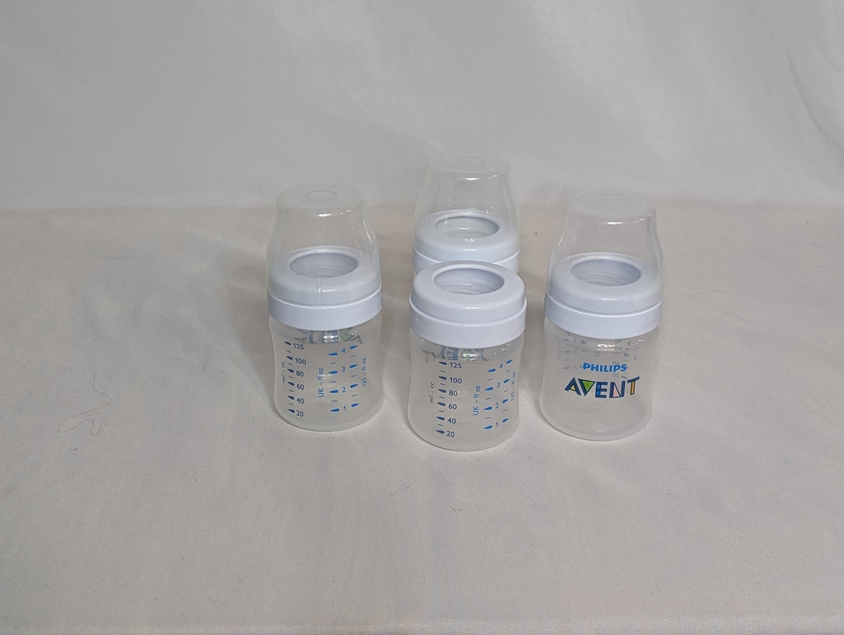 set of 4 Avent bottles, 4 ounces, bottle & ring