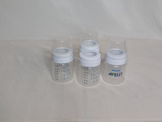 set of 4 Avent bottles, 4 ounces, bottle & ring