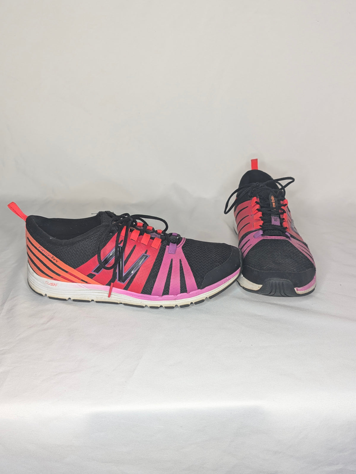 GUC NewBalance sneakers black w/magenta, red, & - size Shoes - Adult 9 1/2