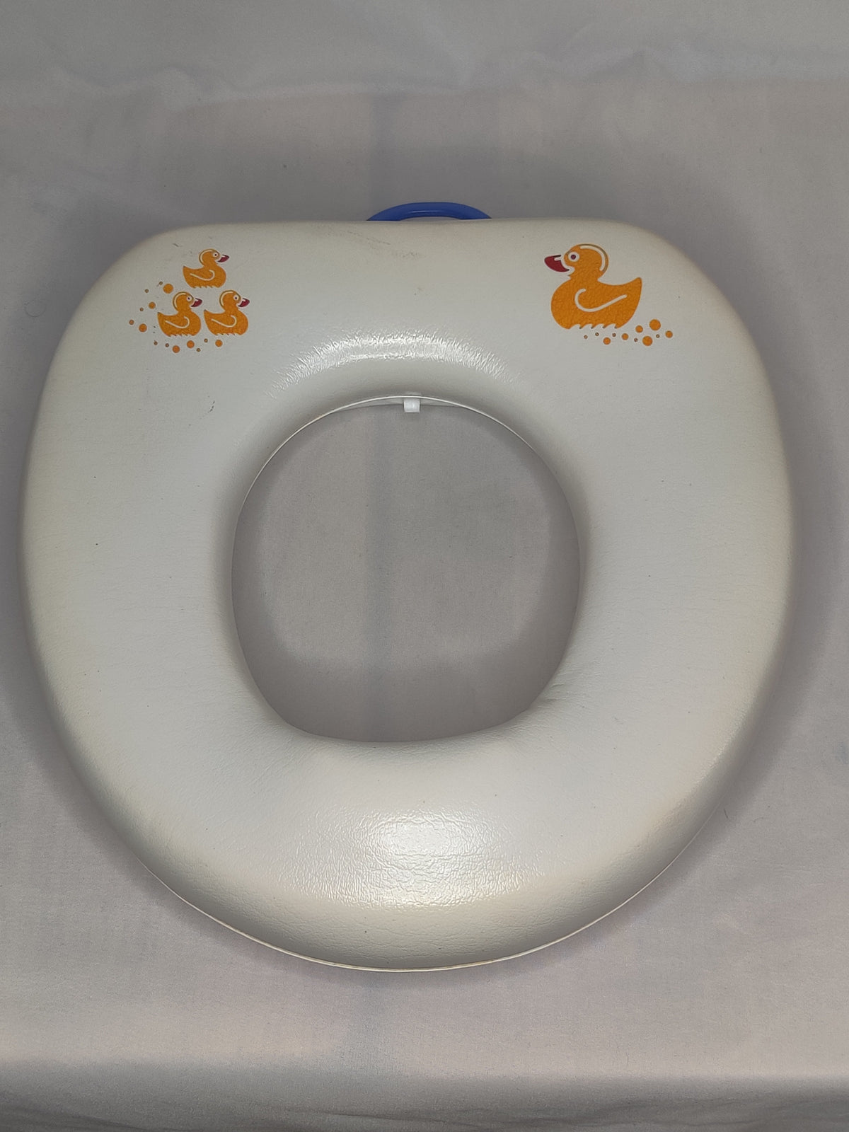 VGUC padded potty seat sits on top of regular