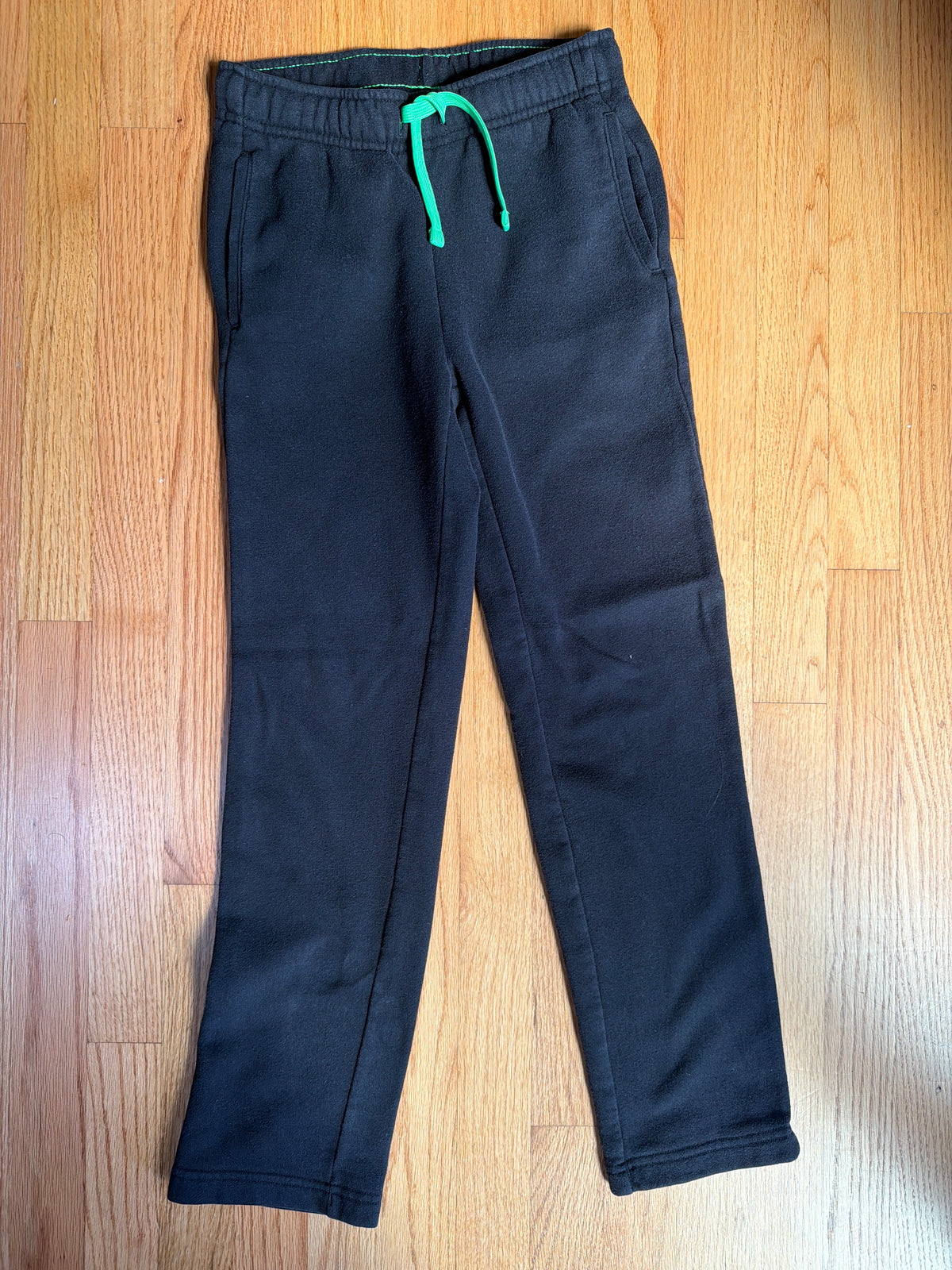 Black Tek Gear pants Green tie, like new - size Youth - 8 (M)