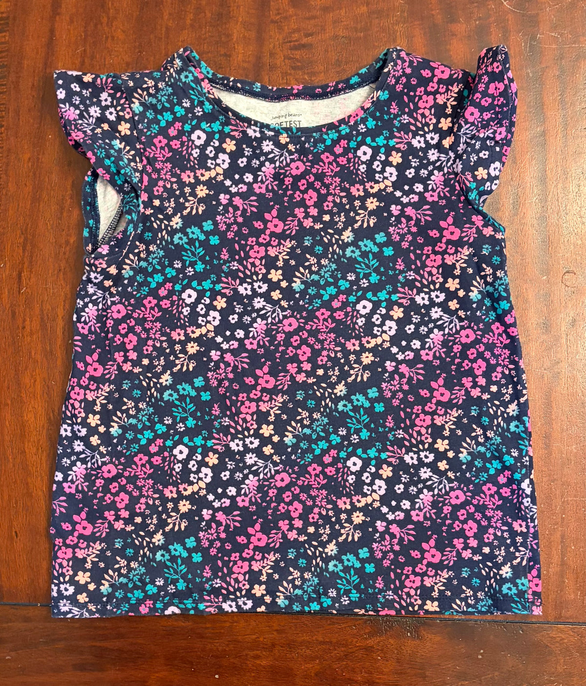 JUMPING BEANS FLOWER SLEEVLESS TSHIRT GUC - size Youth - 7 (S)