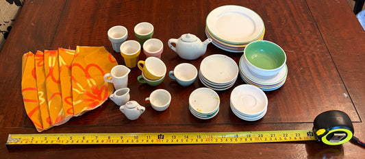 PORCELAIN TEA SET HAS KID PAINTED PLAY