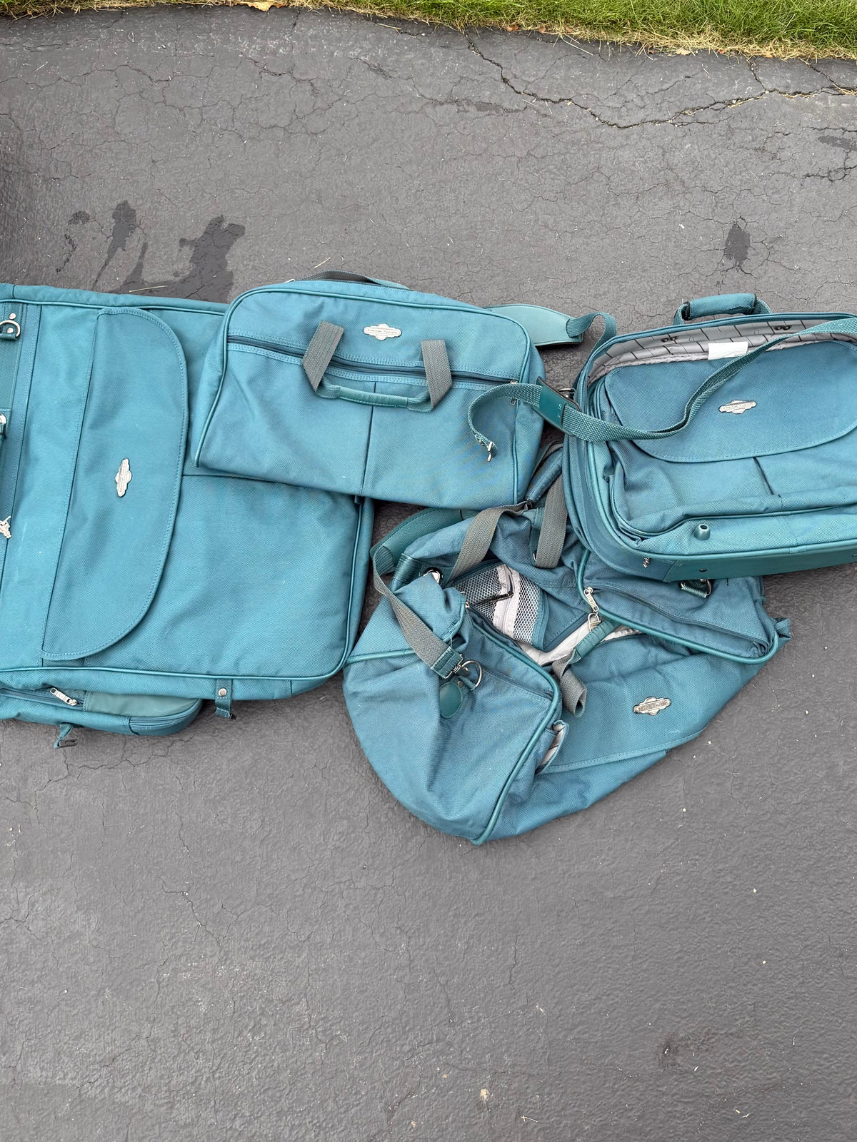 4 piece American Tourist luggage
