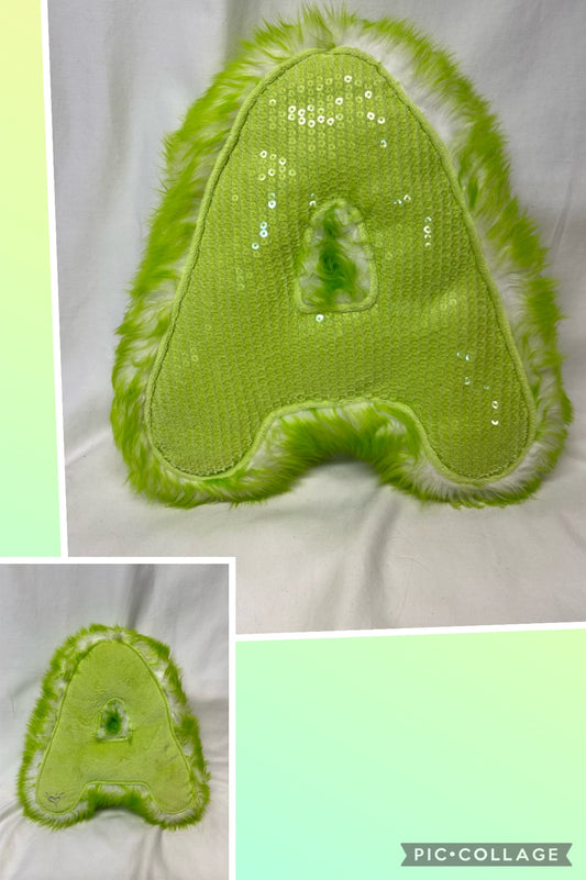 Justice lime green A pillow - fuzzy on one