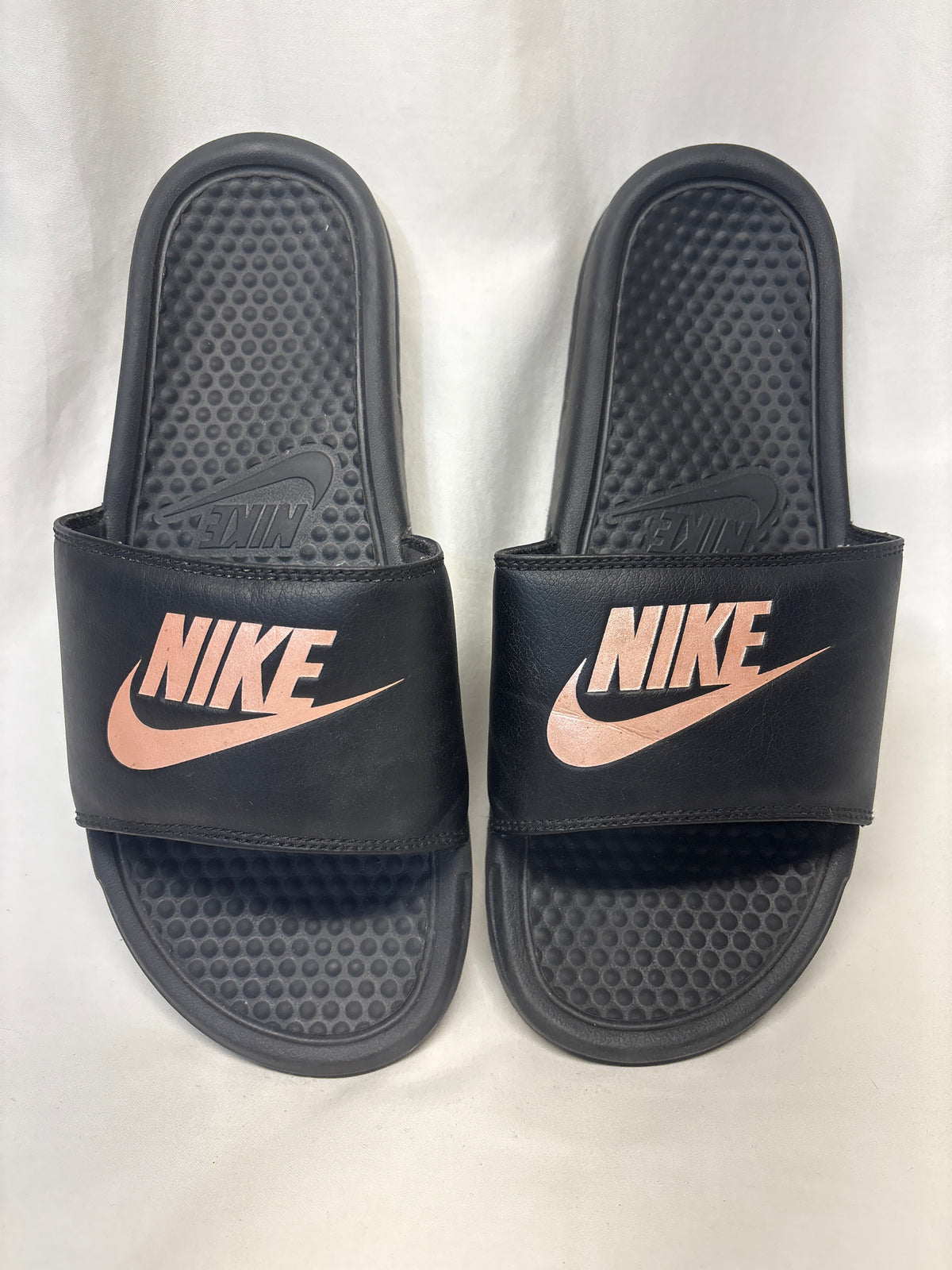 Nike slides - black w/ peach logo - size Shoes - Adult 9