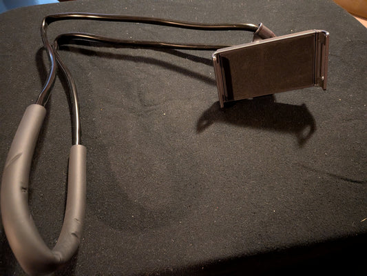 Phone holder adjustable Around neck or freestand