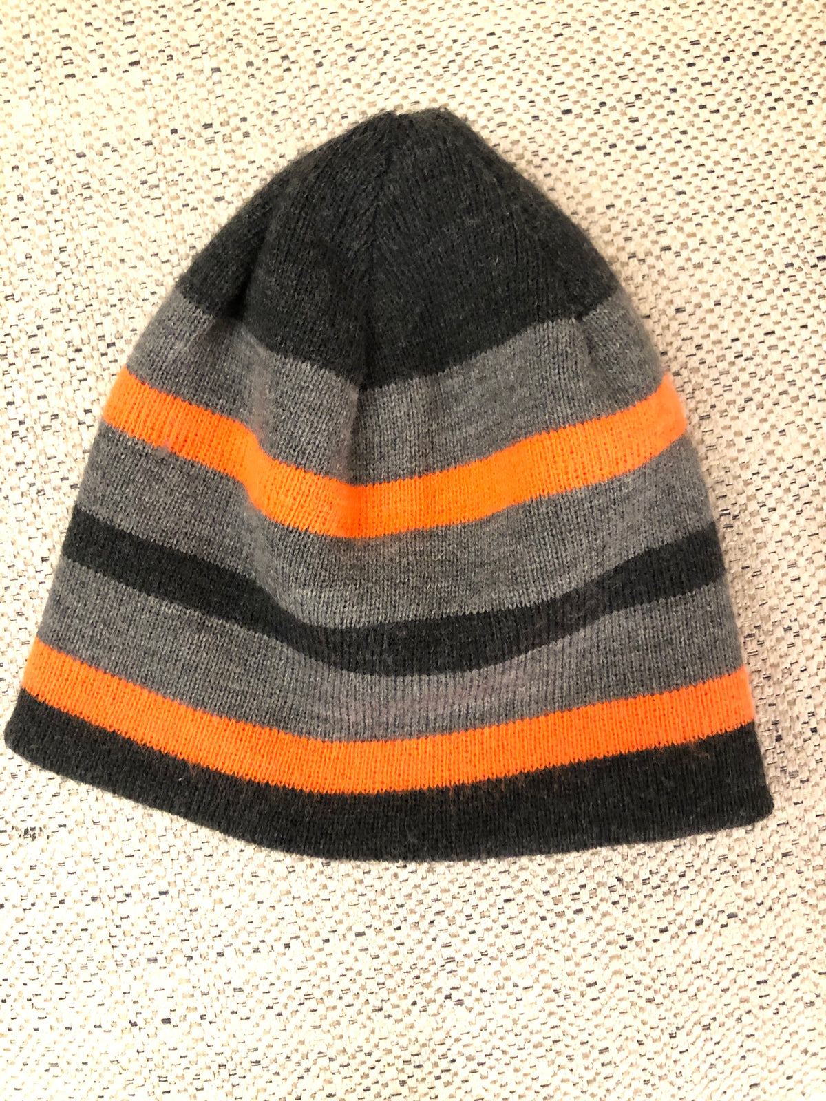 Cute hat. Like new Striped gray orange - size Youth - 5 (XS)