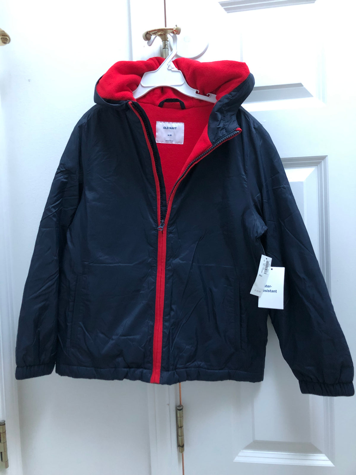 New windbreaker jacket ON. Navy blue. Hood - size Youth - 8 (M)