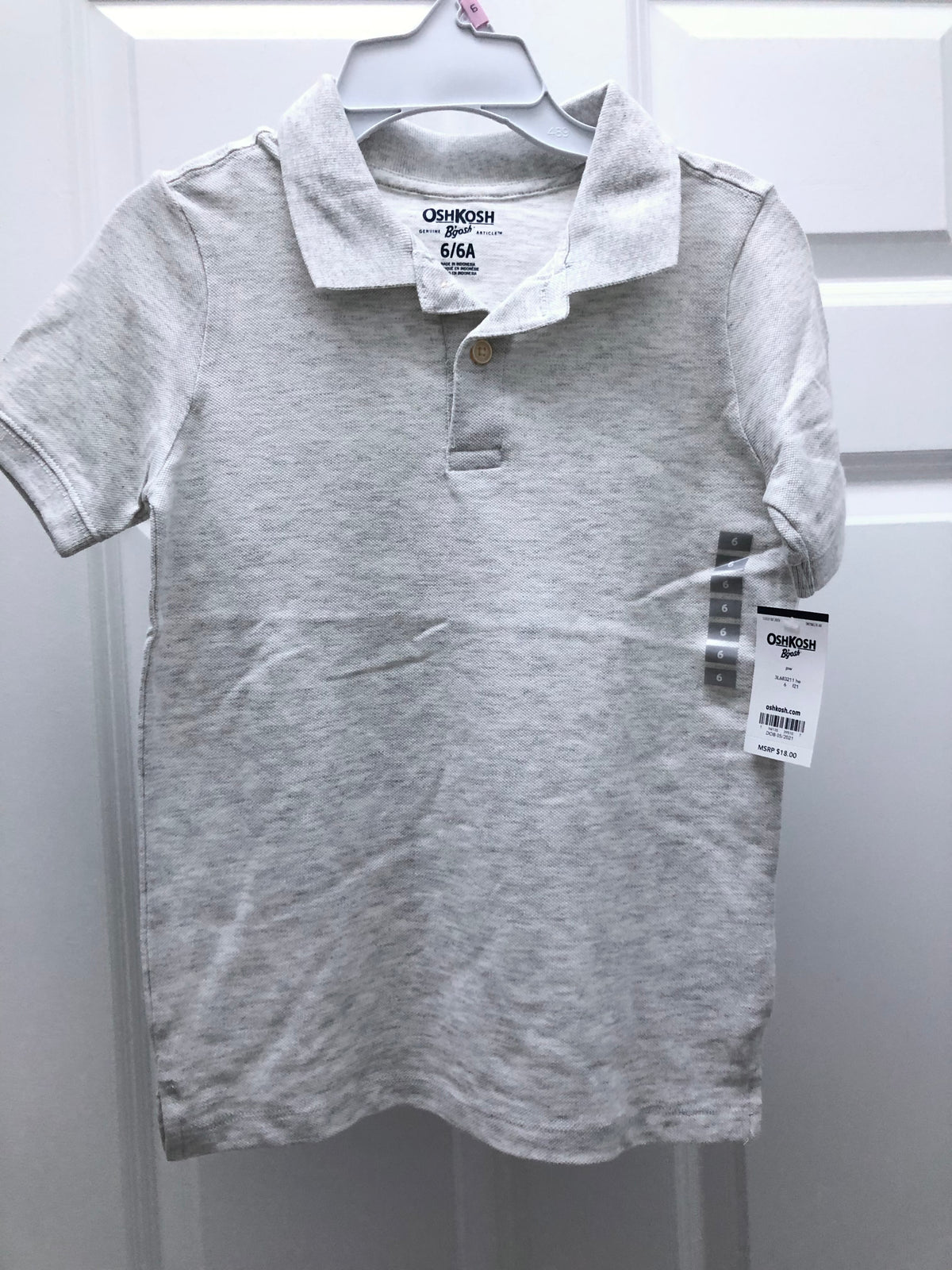 New polo shirt Gray. Uniform - size Youth - 6 (S)