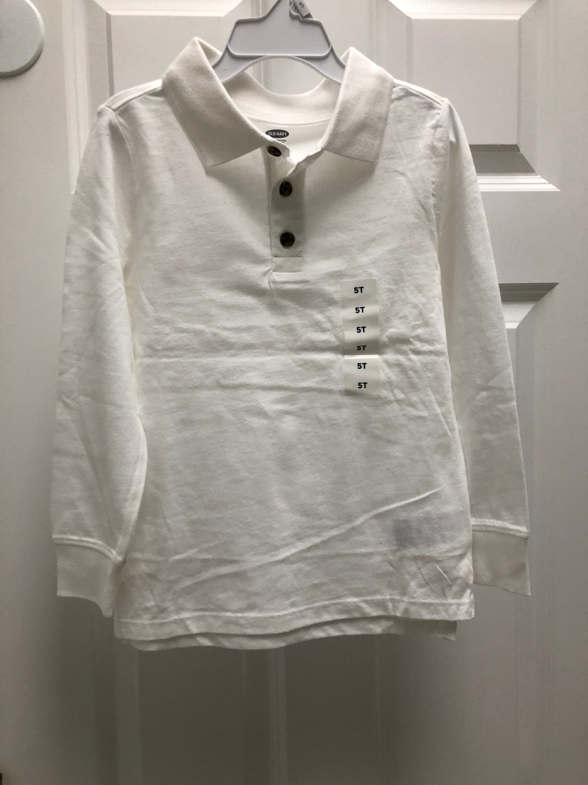 New white polo shirt Long sleeve. 100% cotton - size Toddler - 5T