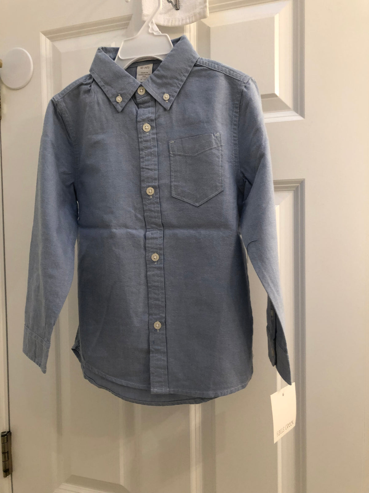 New dress shirt Light blue. 100% cotton - size Youth - 5 (XS)