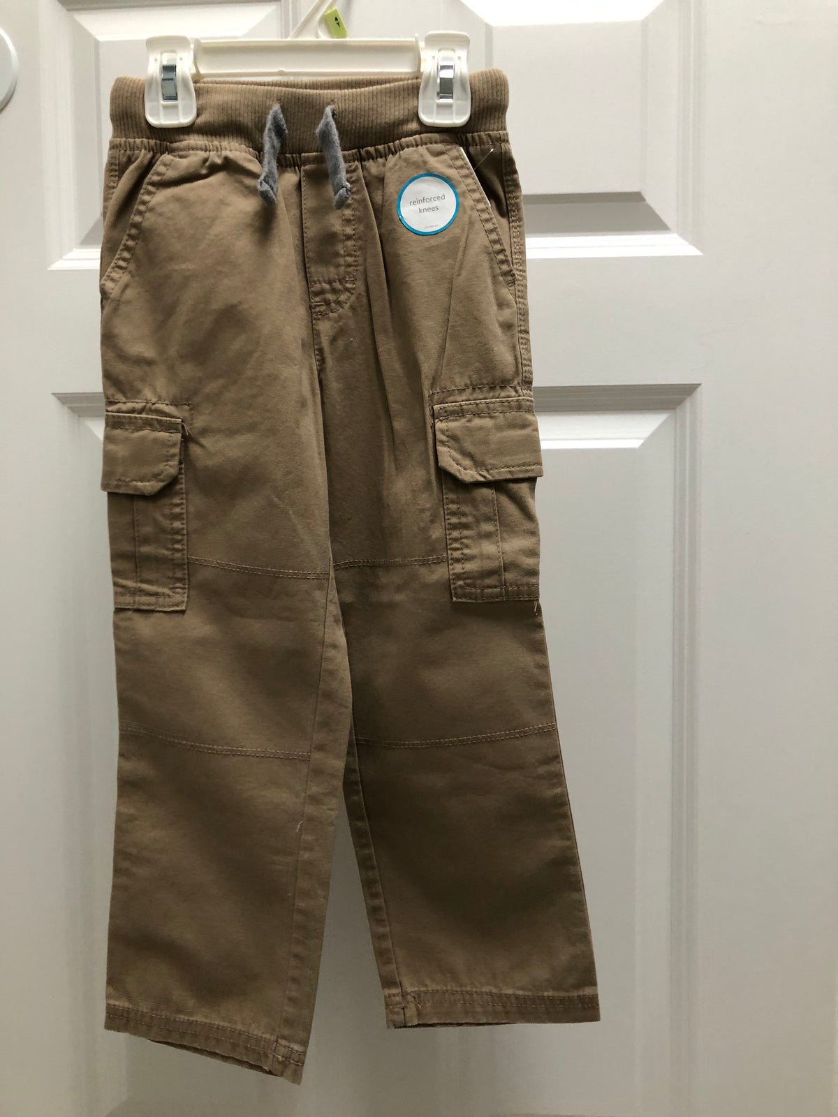 New khaki pants Carters. 100% cotton - size Youth - 4 (XS)