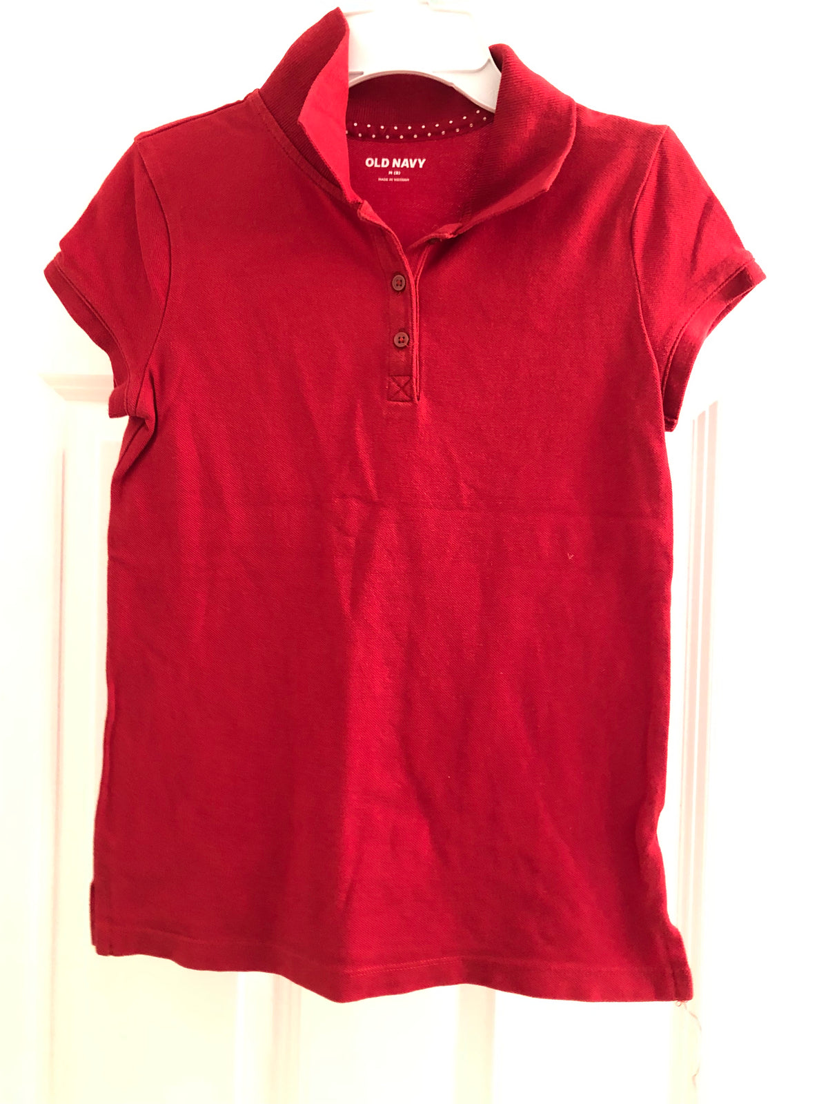 Red polo shirt ON. Short sleeve - size Youth - 8 (M)